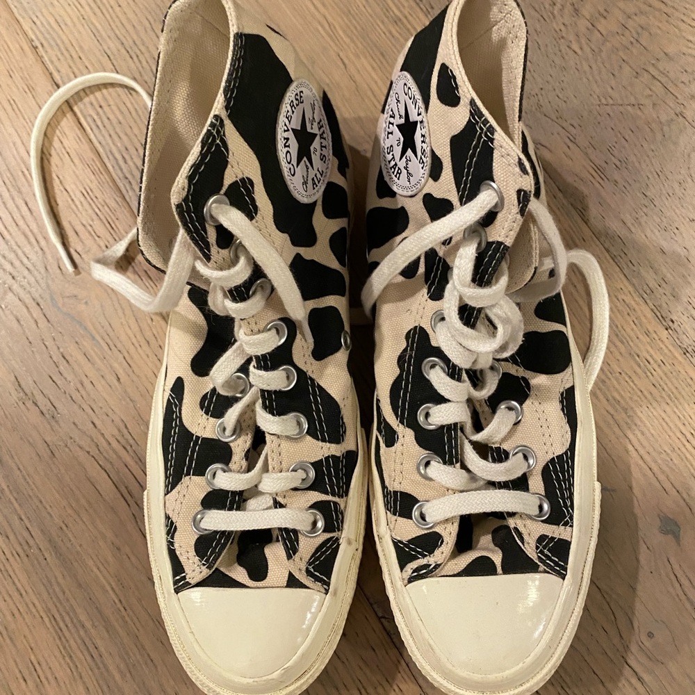 Converse High Top Sneakers in Black and Cream Cow Print